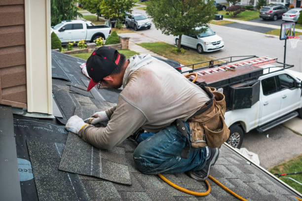 Professional Roofing technician working in Port Washington, NY
